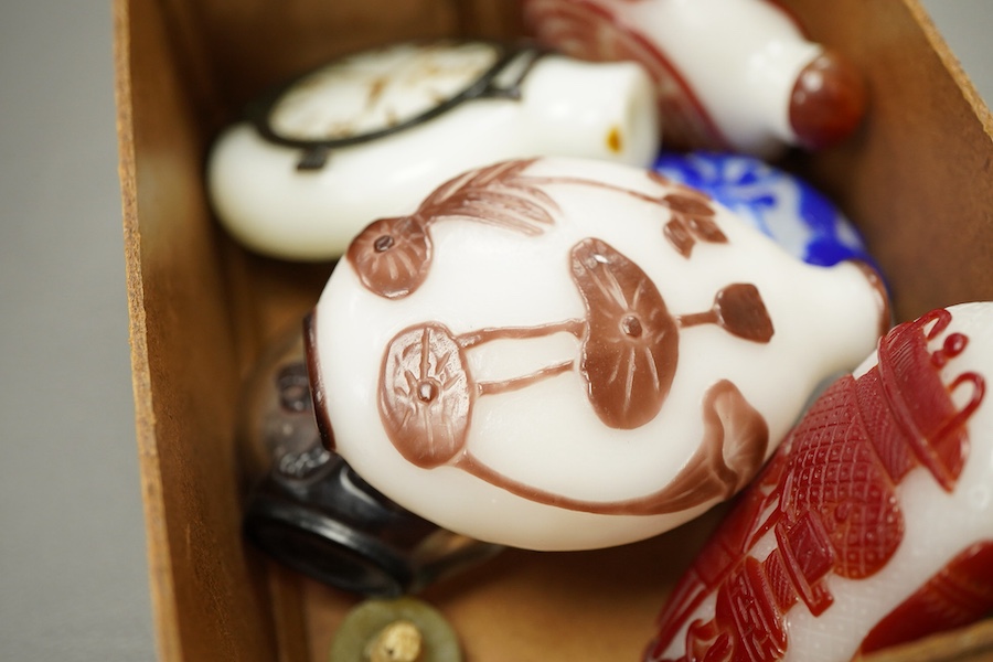 Six Chinese overlaid glass snuff bottles